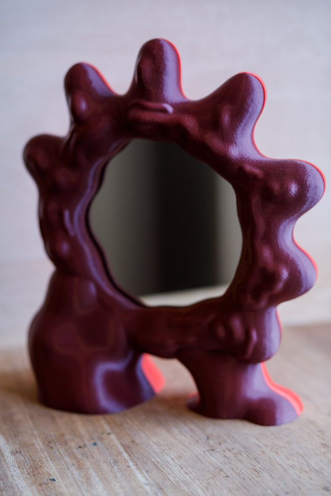 Deep red 3D printed mirror by Wobbly Digital Studio. Made in Glasgow.