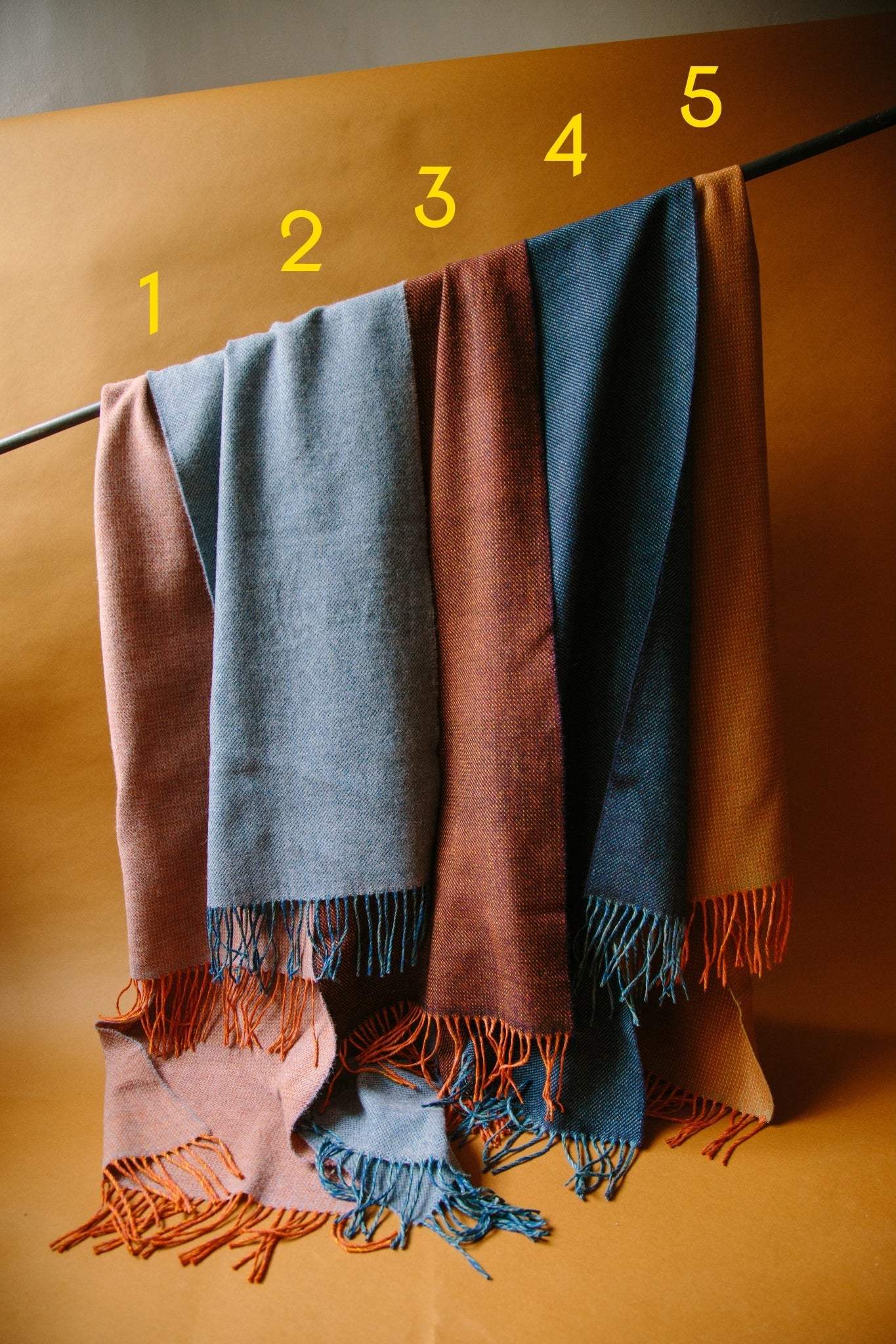 Numbered image of the five merino scarf colours by Drove Weavers.