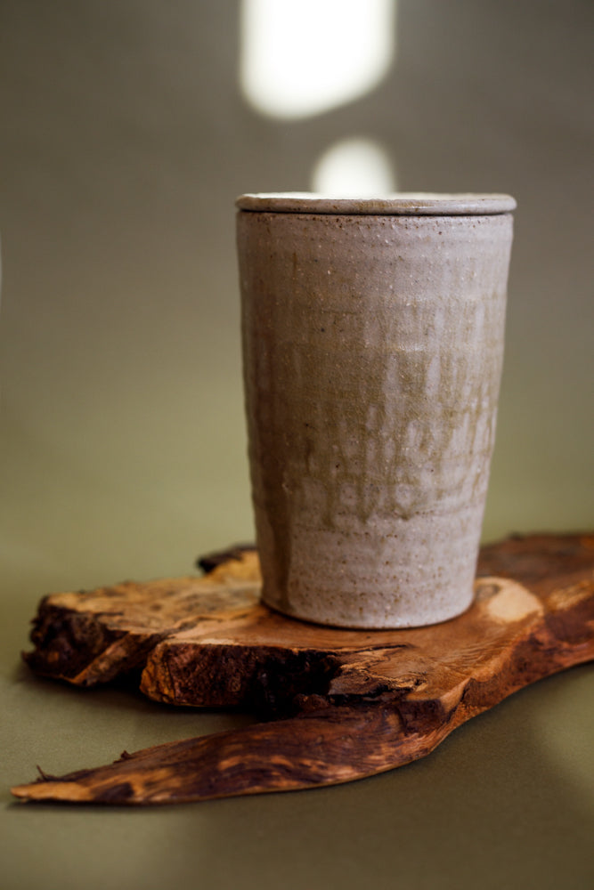 Medium ash glazed lidded jar by Ingot Objects.