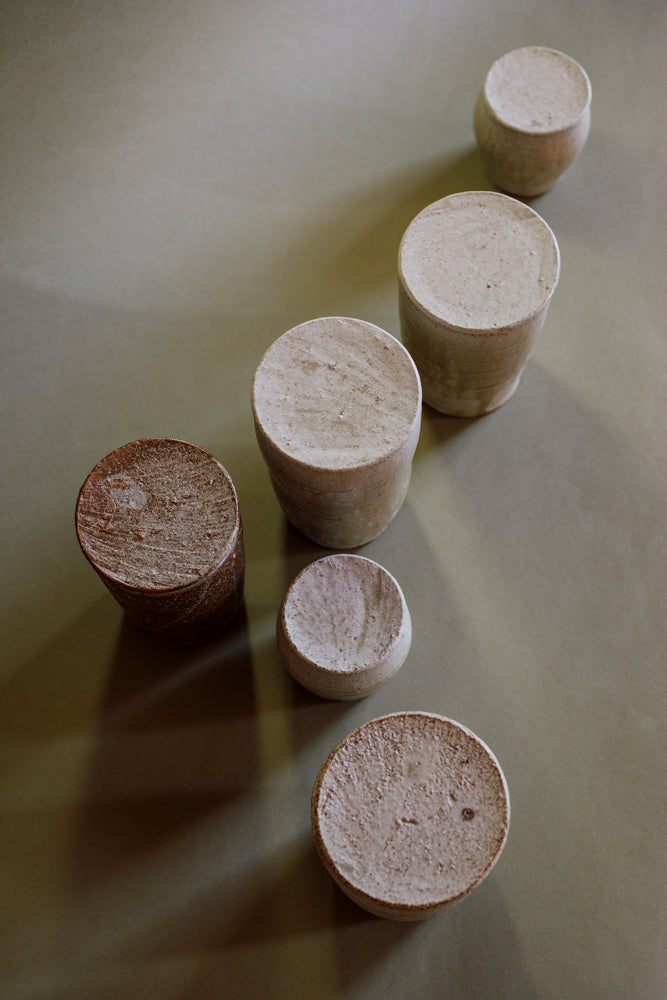 Lidded jars with expressively applied glazed. Hand crafted in Glasgow by ceramicist Jonathan Wade.