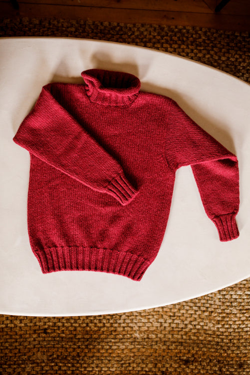 Lupetto neck jumper knitted by Shetland Woollen Co in the colour Special Wine.