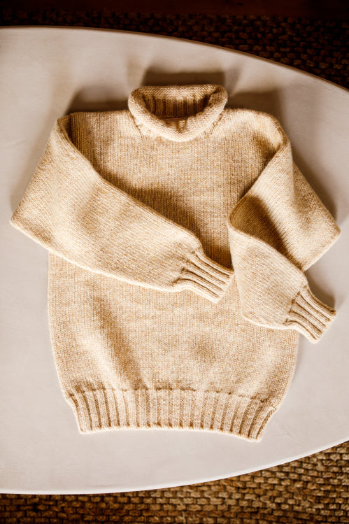 Lupetto neck jumper knitted by Shetland Woollen Co in the colour Corn Cob.