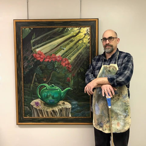 David Heatwole with painting of tea pot and steam turning into flowers