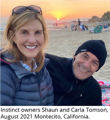 Photo of Instinct owners Shaun and Carla Tomson oh the beach at sunset, August 2021 Montecito, California.