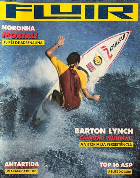 Barton Lynch surfing in the cover of Fluid magazine wearing Instinct gear