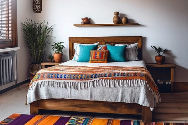 Bedroom with decorative pillows on the bed.