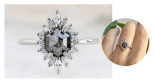 white gold engagement ring featuring a natural black hexagonal diamond with a white diamond halo