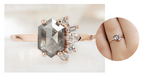rose gold engagement ring featuring a salt and pepper diamond with an attached white diamond cluster