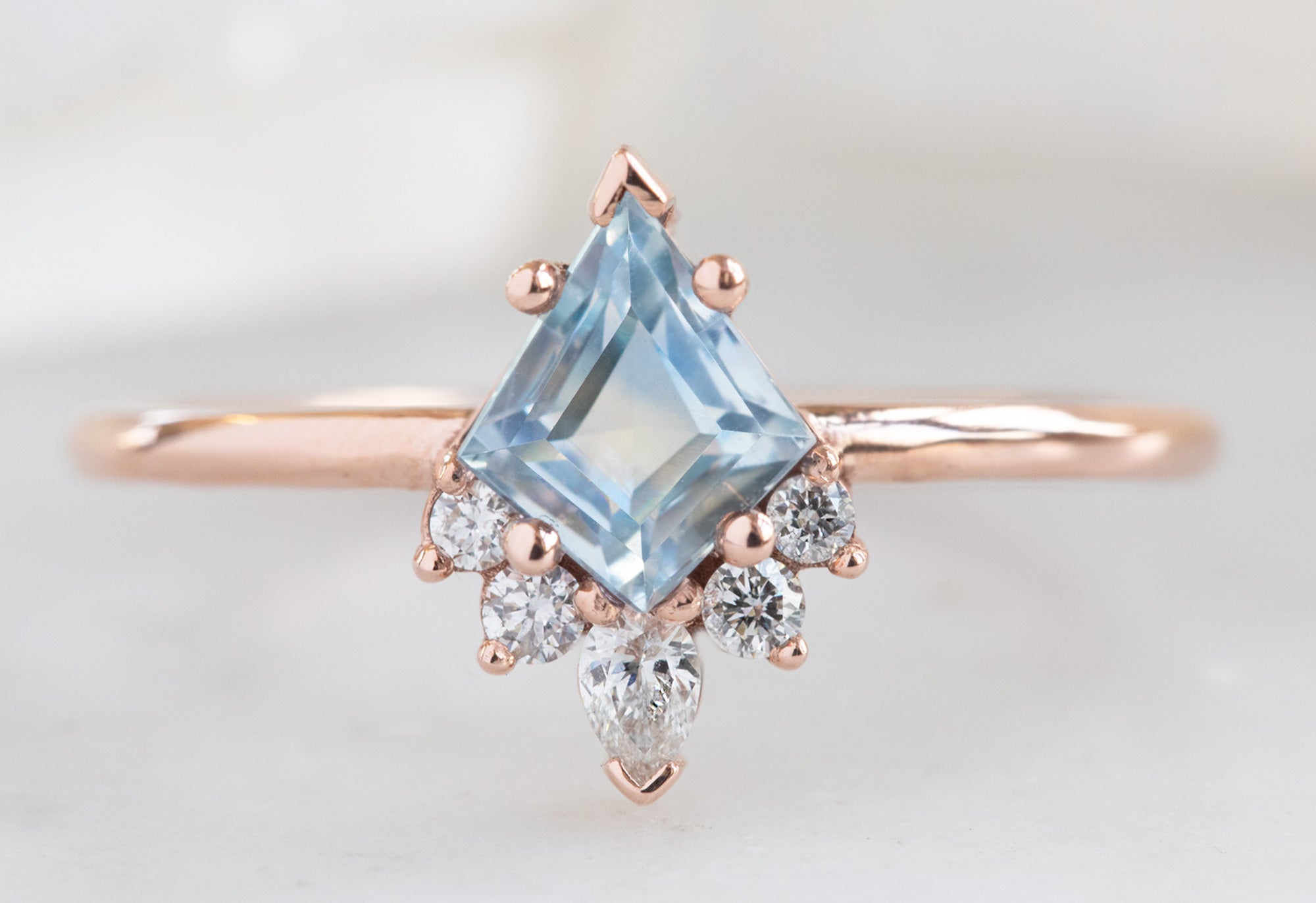 The Aster Ring with a Kite-Shaped Pastel Sapphire