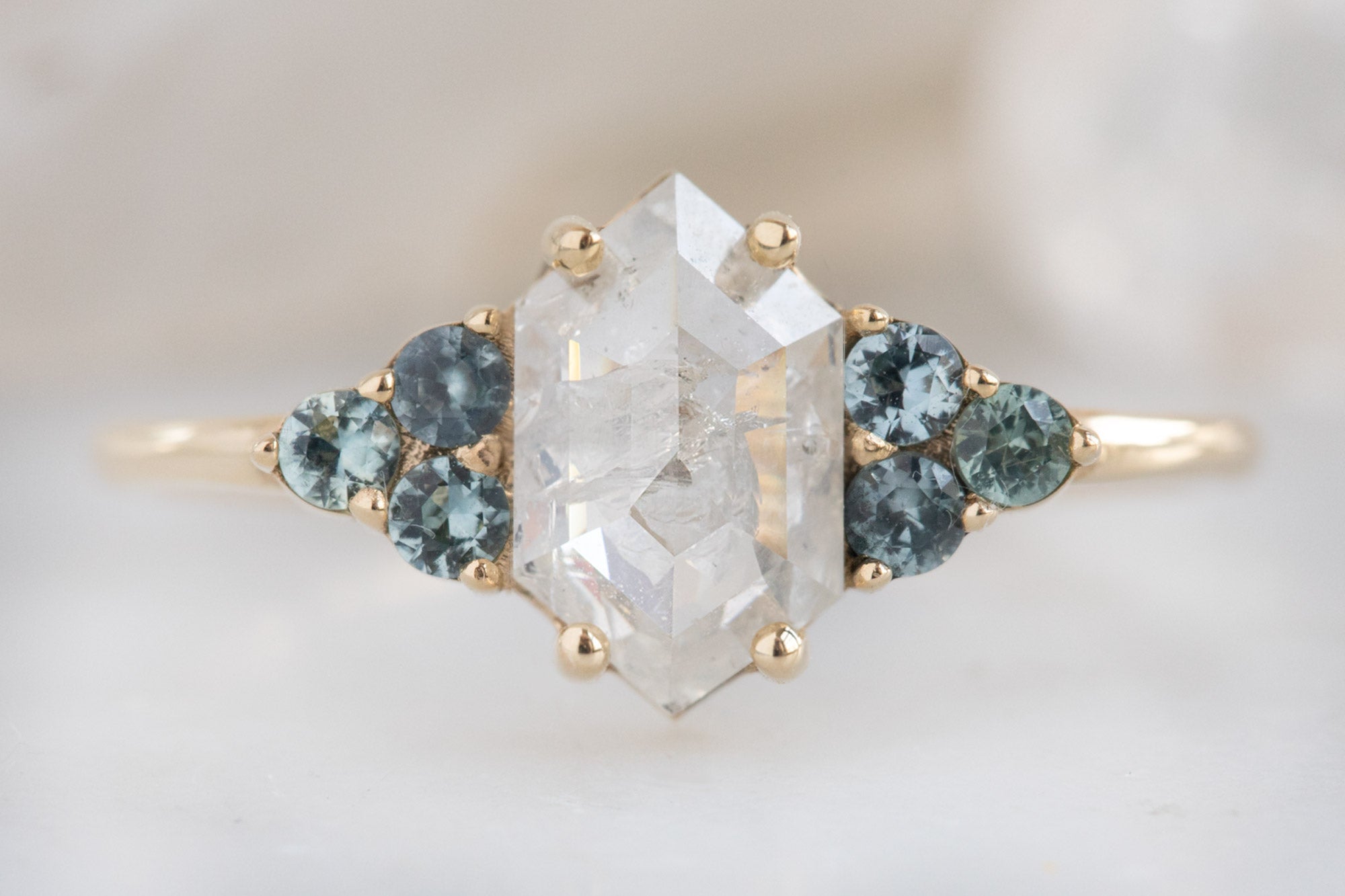 The Ivy Ring with an Icy White Hexagon Diamond + Montana Sapphires