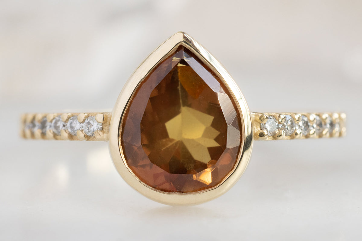 The Willow Ring with an Ochre Sapphire & Alexis Russell