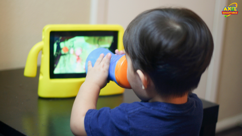 Kid watching cartoon in a tablet