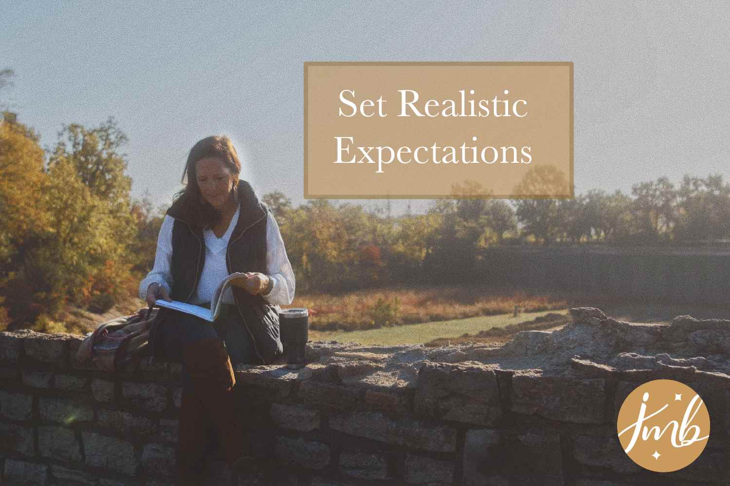 women sitting outside while journaling