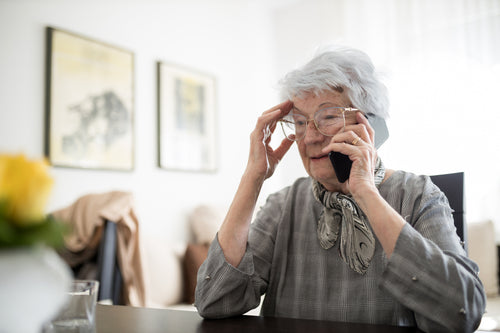 Older woman talking on phone