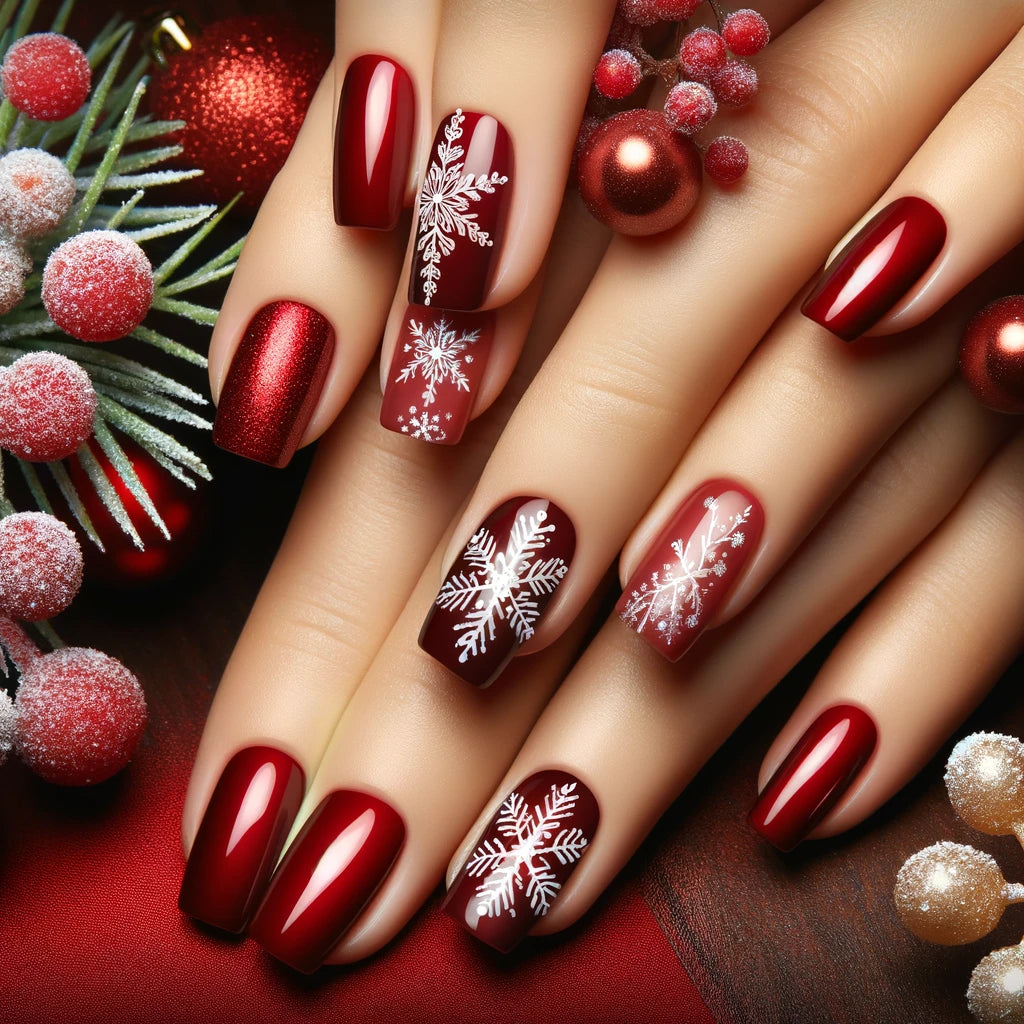 Diseño de uñas rojas con copos de nieve