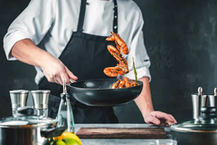 Chef cooking shrimp with Celtic Sea Salt