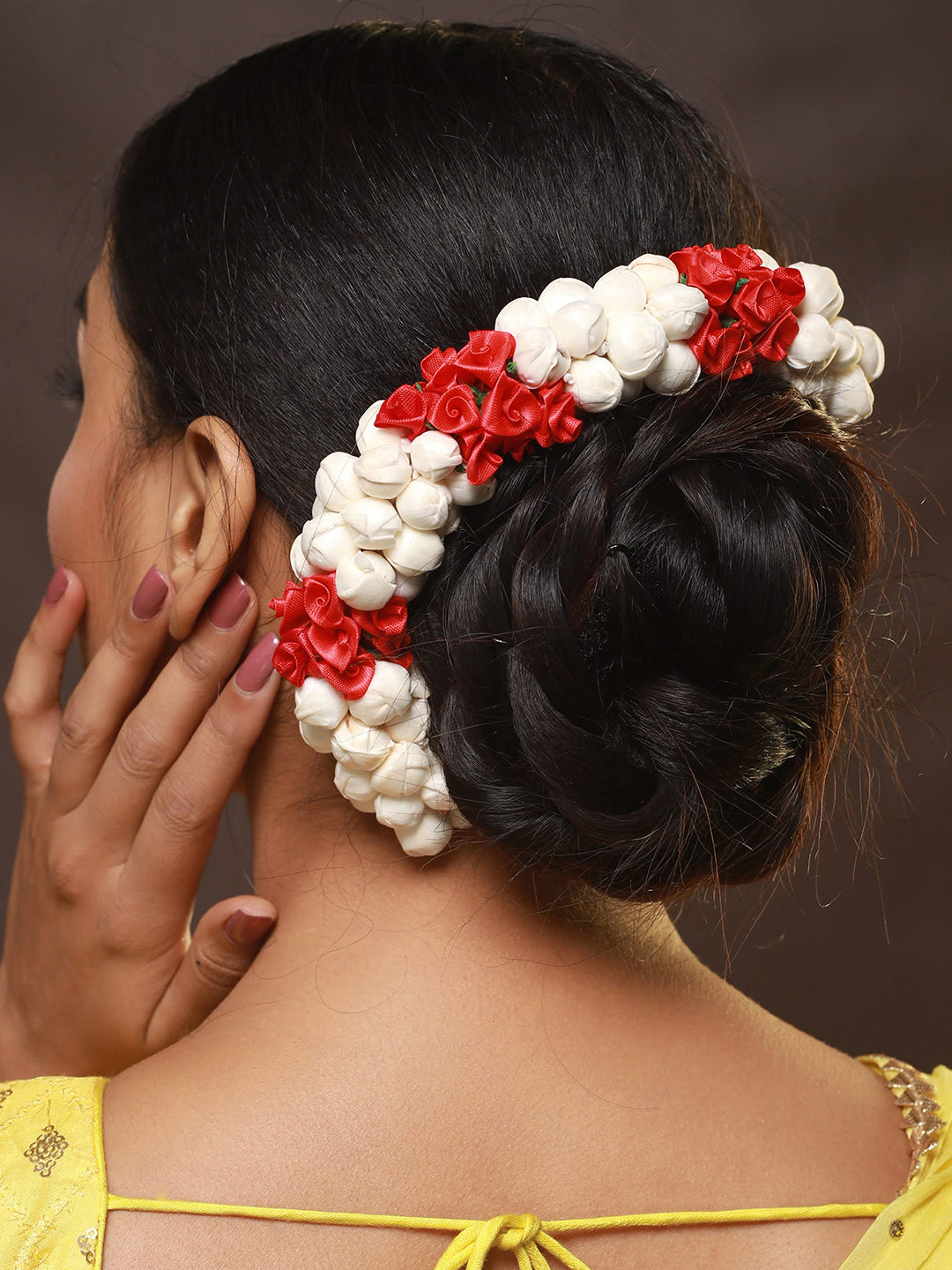 Indian Wedding Bun Hairstyle With Flowers and Gajra