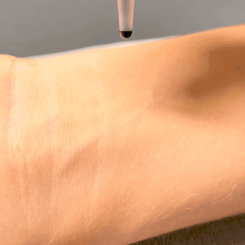 a patch test for lash glue being carried out incorrectly on the skin