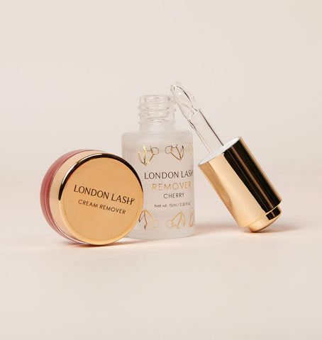 lash extensions remover – a pot of cream remover next to an open bottle of gel remover