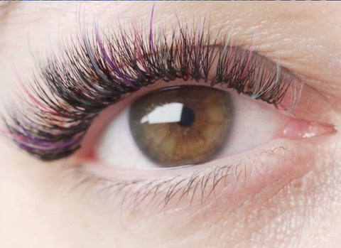 a set of lashes with spikes made of different colored lash extensions
