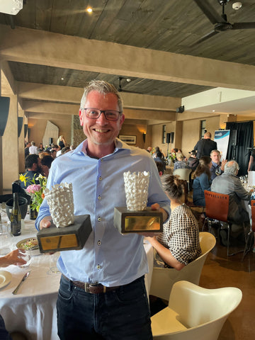 Winemaker, Kyle Thompson with Both 2022 Trophies