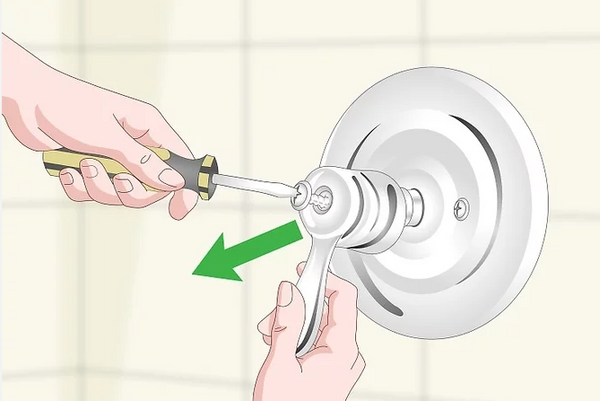 Use a screwdriver to remove the shower handle