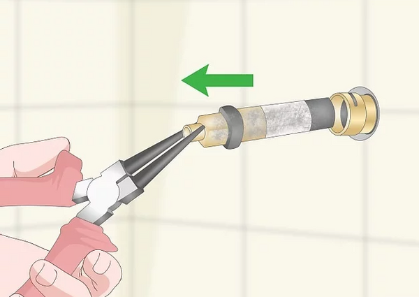 Use needle-nose pliers to pull out the cartridge