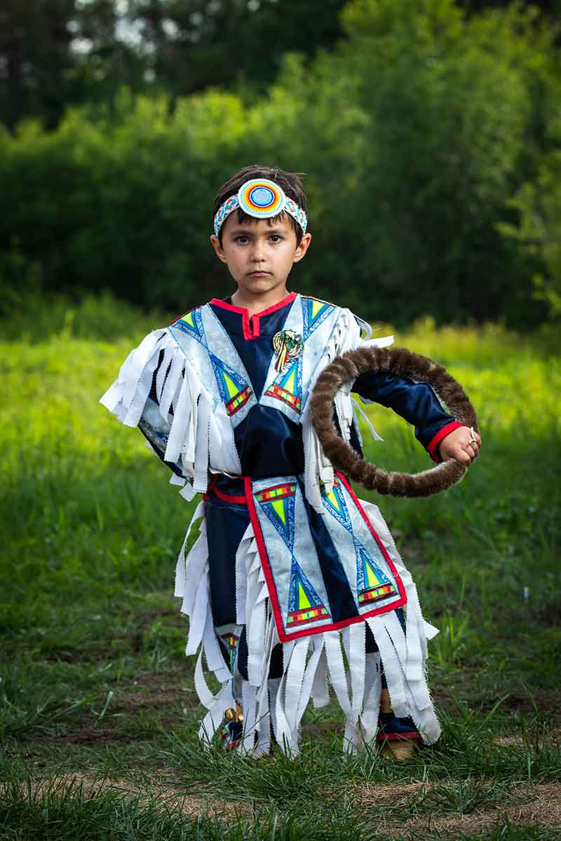 Junior powwow dancer in his regelia