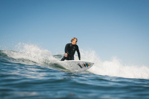 Tom Cuts back on his new channel island surfboard