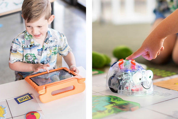 Boy playing with blue bot toy