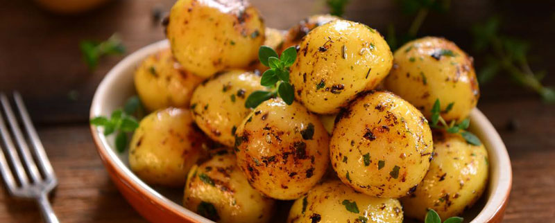 Bowl of cooked baby potatoes