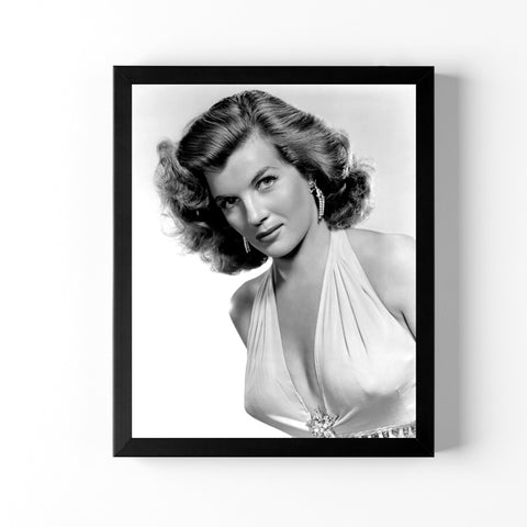 Bring your space to life with this unique Corinne Calvet artwork. This one-of-a-kind vintage photographic image has been faithfully reproduced on canvas and is sure to add a touch of glamour and retro sophistication to any home décor.