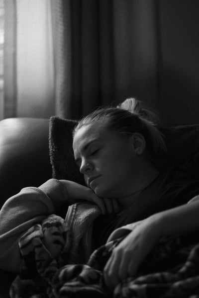 young-woman-sleeping-on-the-sofa