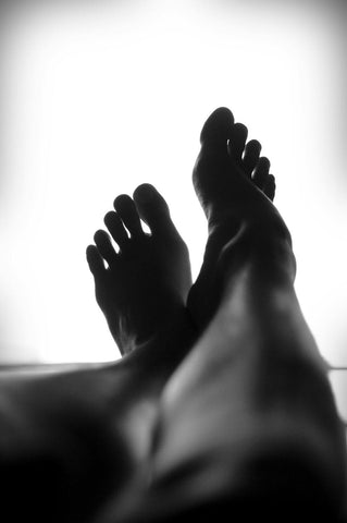 les jambes et les pieds d'une femme après un massage
