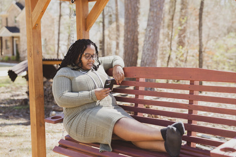 Young lady holding a smart phone