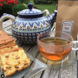 Darjeeling Tukdah, in een glazen kopje, met een Theepot van Bunzlau Castle