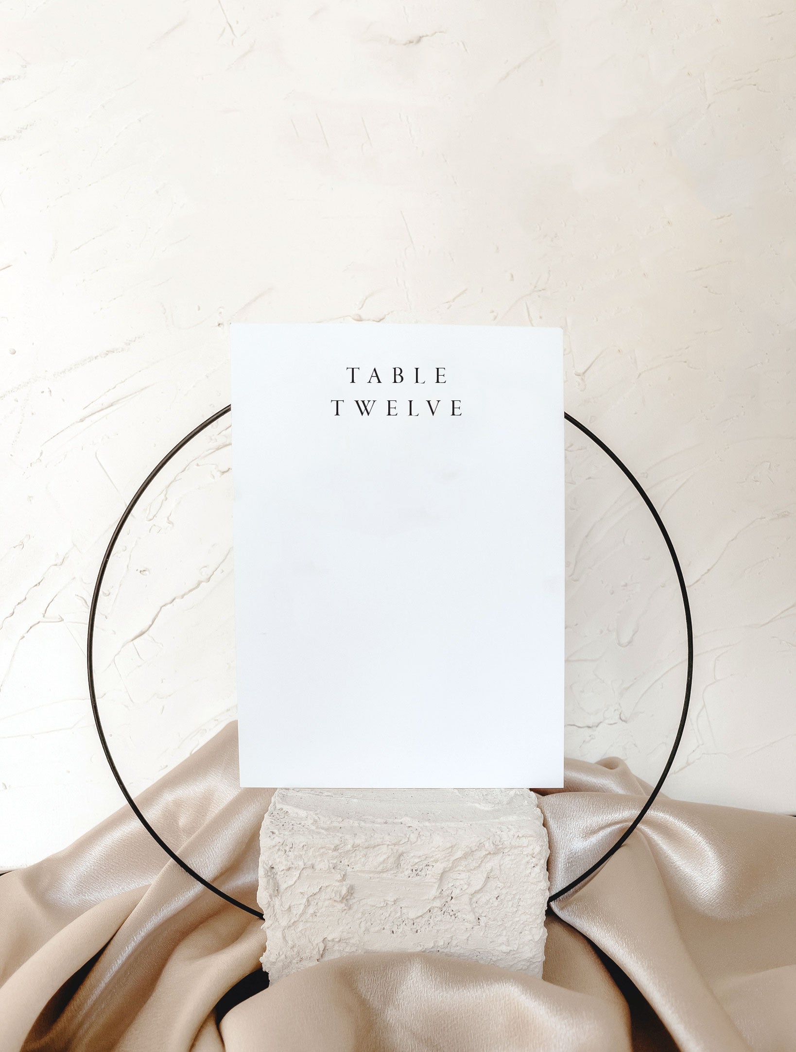 Minimal table number with modern sculpture