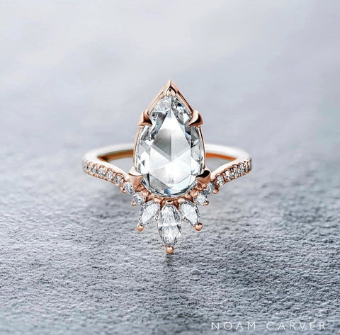 a rose cut pear shaped diamond on a rose gold ring