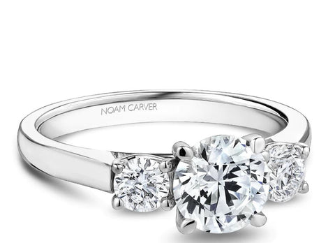 a three stone diamond engagement ring in white gold