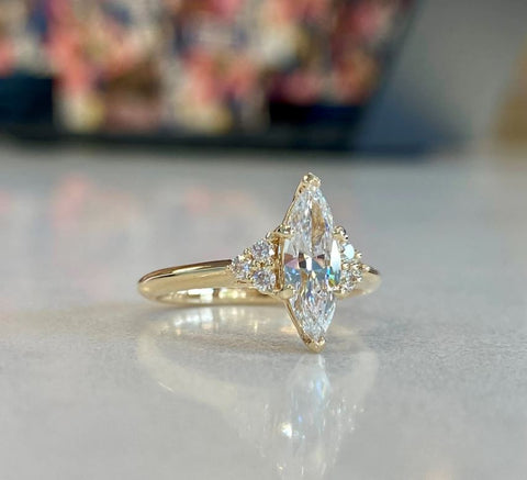 a marquise diamond in yellow gold