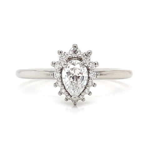 a solitaire engagement ring style with a halo setting