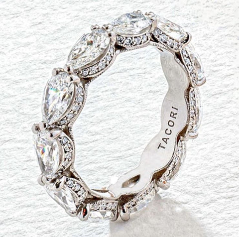 an eternity band with pear shaped diamonds