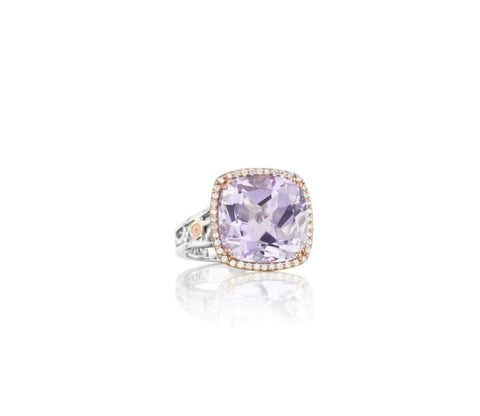 a cushion shaped rose amethyst is set into rose gold surrounded by white diamonds