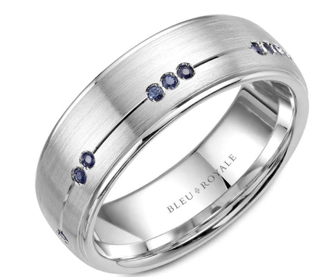 a mens white gold wedding band set with blue sapphires