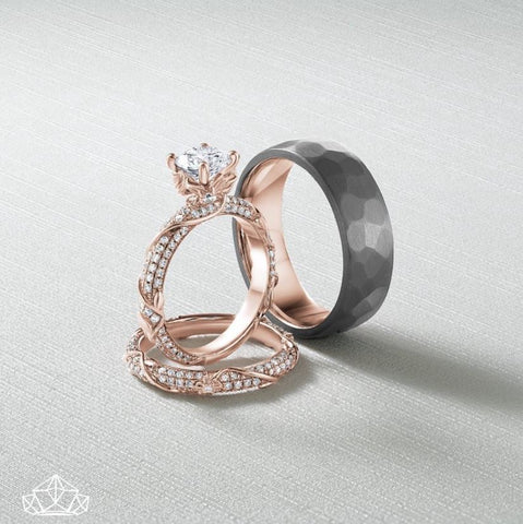 rose gold engagement ring and matching wedding band alongside a complimentary mens band