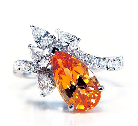 a spessartite garnet and diamond ring