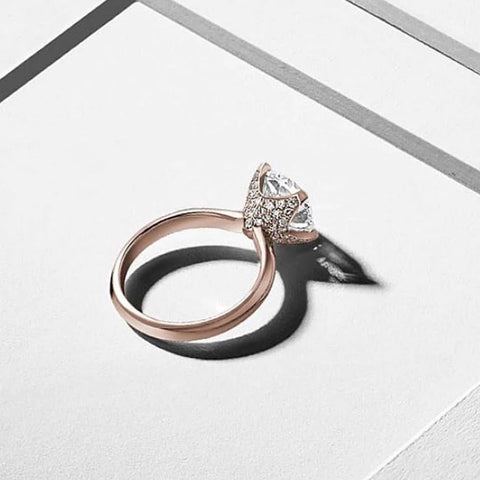 a rose gold diamond solitaire engagement ring