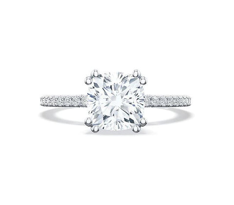 a white gold cushion cut engagement ring