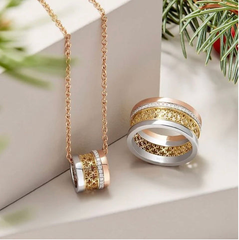 tri gold diamond ring and earrings set by birks