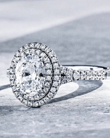 an oval shaped diamond engagement ring